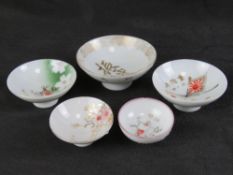 Five assorted 20th century Japanese porcelain bowls.