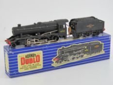 A Hornby Dublo 2-8-0 freight locomotive and tender in original box.