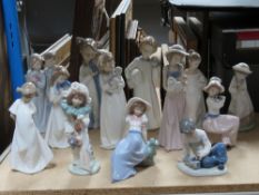 Thirteen assorted Nao figurines 12-25cm high.