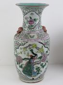 A large and impressive Chinese famille rose open necked shoulder vase in pinks and greens decorated