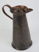 Art Nouveau: a hand made late 19th century hinge lidded copper hot water jug with riveted handle