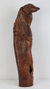 A large carved bamboo figure of an Oriental deity standing 62cm high.