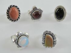 Five hardstone rings each stamped 925, size M-N, including gold stone and onyx.