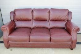 A three seater leather sofa,