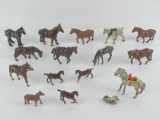 A quantity of assorted Britains hand painted lead farm horses, sixteen in total.