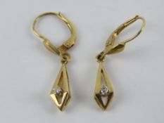 A pair of 9ct gold and diamond earrings, hallmarked 375 to the hanger, 2.1g.