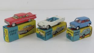 A Corgi Toys Morris Mini Minor No226, together with a Chevrolet Impala No220,