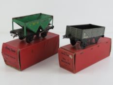 A Hornby 0 gauge number one wagon (back wheels deficient) together with a Hopper wagon,
