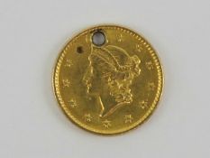 An 1852 United States of America 'Liberty Head' 21.6ct gold (0.900) 1852 $1 coin, 1.6g.