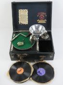 The Pixie Grippa Periphone gramaphone complete with winding handle, trumpet and needles.