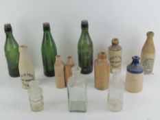 A quantity of vintage stoneware and glass beer bottles etc, includes Manning & Co Northampton,