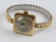 A 9ct gold ladies cocktail watch on expanding Excalibur bracelet, having london import hallmarks,