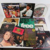 A quantity of assorted records including; Michael Jackson, Janet Jackson, Vanilla Ice,