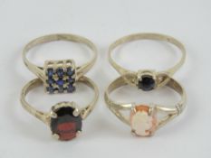 Four HM silver rings; solitaire sapphire size O-P, sapphires in square setting size M-N,