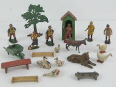 A quantity of assorted Britains hand painted figurines including figures, geese, donkey, tree,