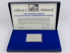 A Danbury Mint Silver commemorative 'stamp'; The Tower of London 900th Anniversary.