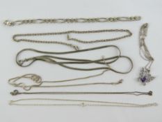 Five silver chains, together with a section of white metal chain, 1.24ozt.