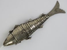 An Indian white metal articulated fish attar-dan, Bengal, probably Monghyr, late 19th century,
