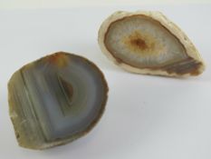 Two geodes being a blue banded agate 6cm wide, and a brown druzy crystal, 9 x 5cm.