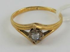An 18ct gold diamond solitaire ring approx 0.1ct, stamped 18ct, size M, 2.5g.