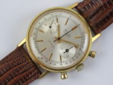 An Avia chronograph wristwatch having white dial with two subsidiary dials and leather strap.