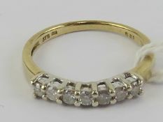 A 9ct gold and diamond half eternity ring, total 0.
