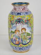 A Chinese Canton enamel on brass vase having European scenes upon a yellow ground with further