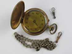 A Temaxi full hunter top wind pocket watch, a/f, together with a HM silver graduated guard chain,