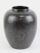 A Mid 20th century Poole Pottery black lustre vase standing 22cm high.
