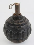 An inert WWI German Kugel grenade with fuse.