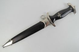 A WWII German SS Mans dagger made by Richard Herder Solingen, having 22cm blade, with scabbard.