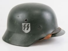 A German over-painted SS single decal helmet,