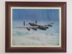 'Moonlight Return' a print of a painting by Gerald Palmer of a Lancaster bomber in flight,