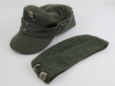 Two reproduction WWII German caps being SS ski cap and side cap.