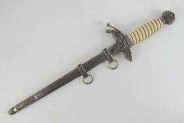 A WWII German Lufftwaffe 2nd model Officers dagger having 24.5cm blade, with scabbard.