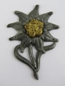 A German Edelweiss Mountain Troops badge, marked G.B.41 to back.