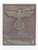 A WWII German metal door plaque.