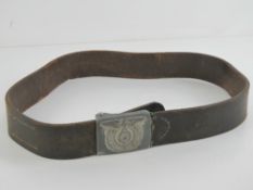 A WWII German SS belt having old glue repair, with buckle.