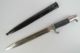 A German K98 parade bayonet having 25cm blade marked Alcoso Solingen, with scabbard.