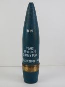 An inert 76mm British practice shell head standing 36cm high.