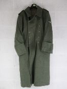 A reproduction WWII German Great Coat.