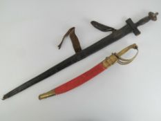 An Indian sword having brass horse head grip together with a Sudense? sword having leather covered