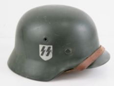 A German over-painted SS double decal helmet,