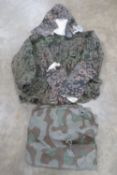 A Zelt bahn with jacket hood and reproduction SS camouflage jacket.