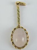 To match above Lot; A 9ct gold rose quartz pendant measuring 4.