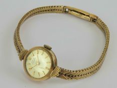 A vintage 9ct gold Girard Perregaux ladies cocktail watch on 9ct gold bracelet strap,