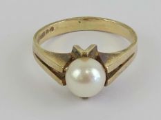 A 9ct gold and pearl ring, size K-L, 2.6g.