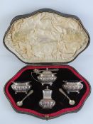 A superb HM silver cruet set in original fitted silk and velvet lined case, comprising pepper,
