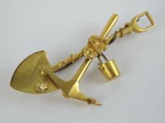 A Victorian 15ct gold 'Grand Tour' South African souvenir brooch in the form of shovel,