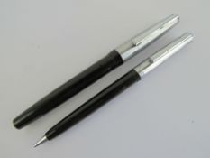 A Platignum fountain pen having 14ct gold nib, with Platignum propelling pencil.